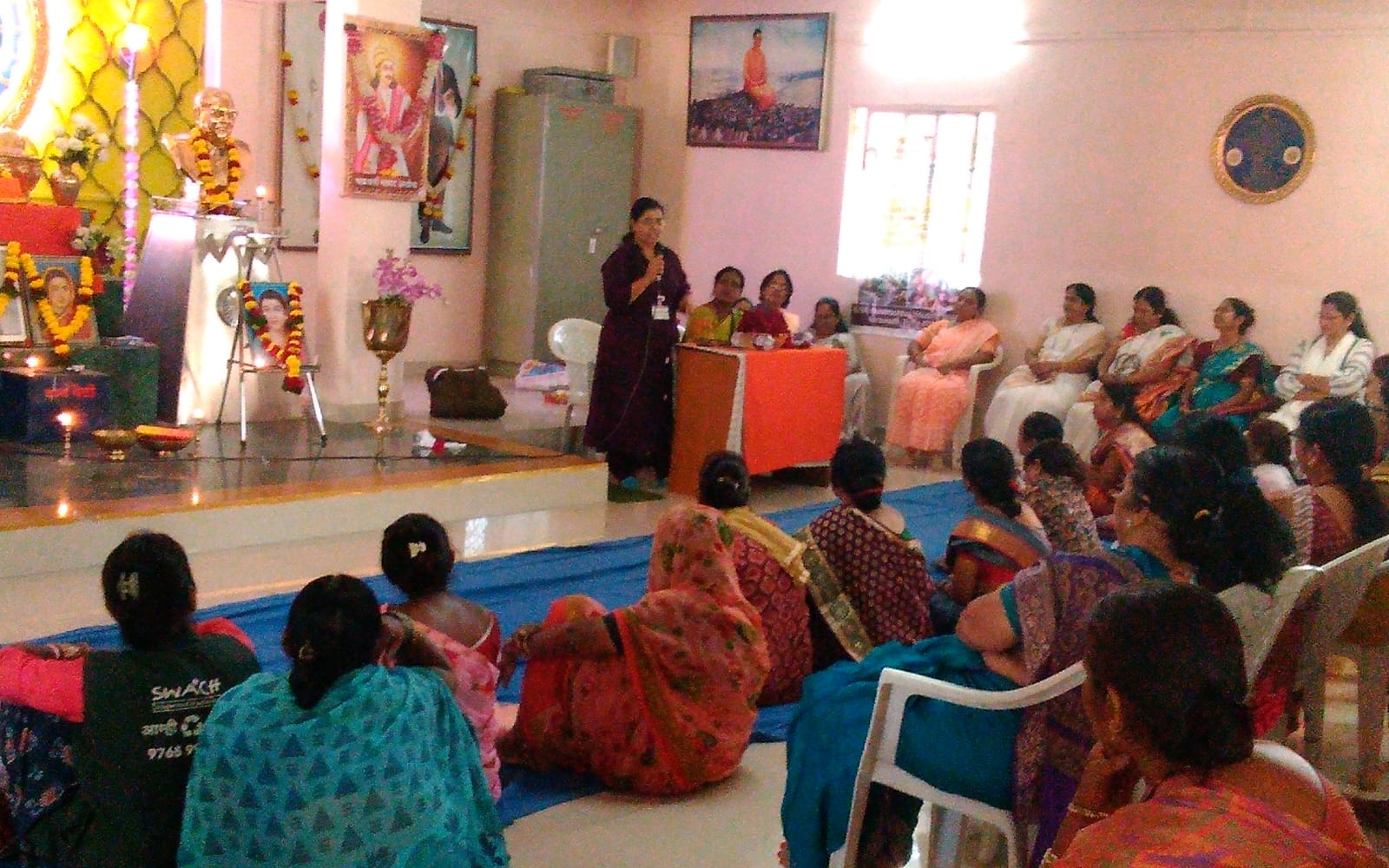 Adolescent girls attentively participating in a life skills workshop.